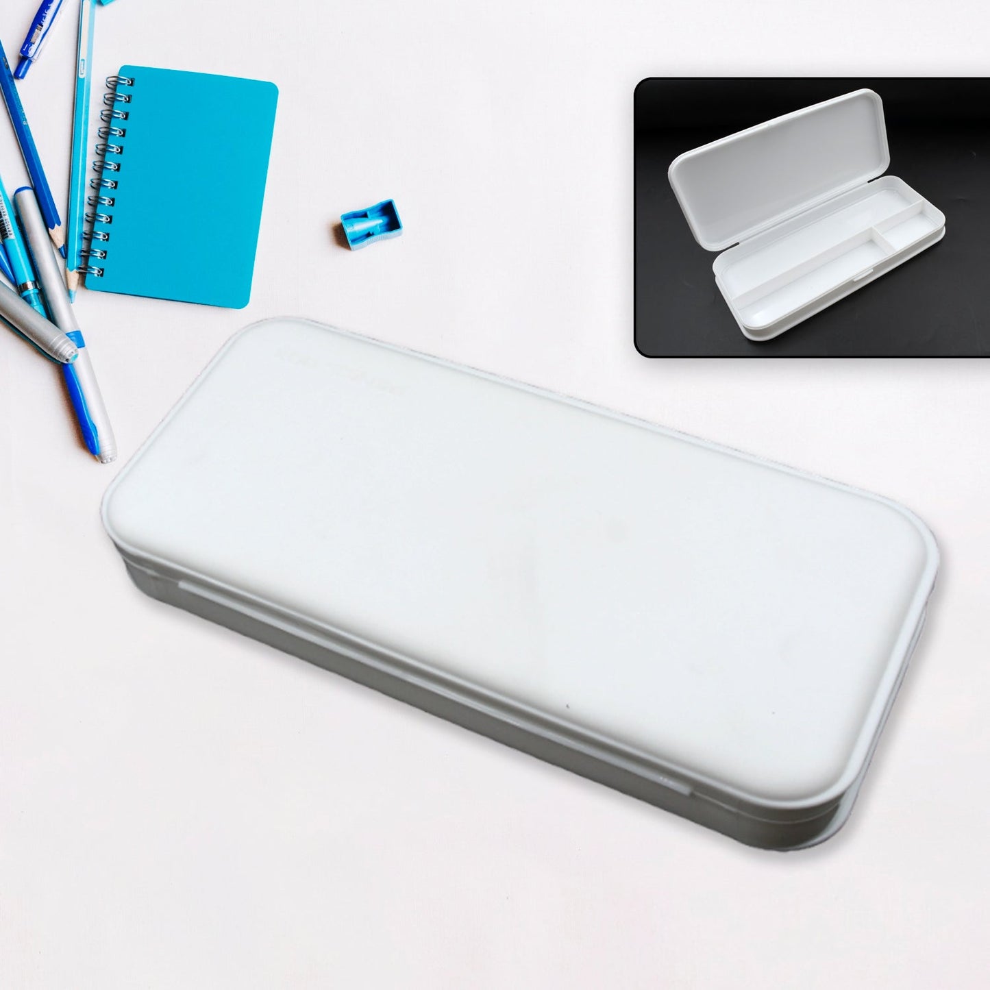 White pencil box with multiple compartments for kids' school supplies