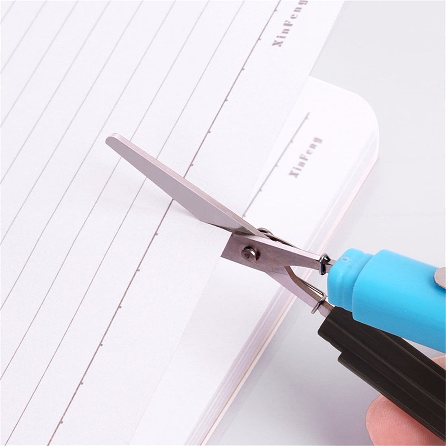 Scissor designed to look like a pen, useful for various cutting tasks