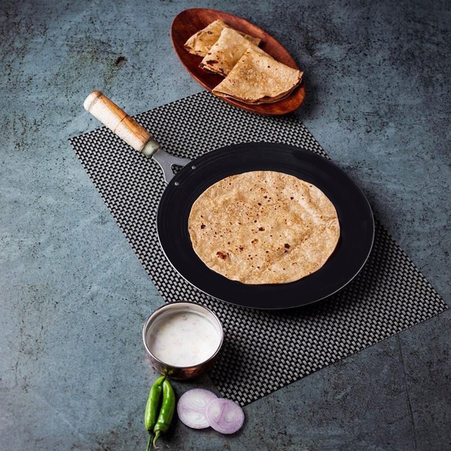 Nonstick wooden handle roti tawa, ideal for everyday cooking of rotis.