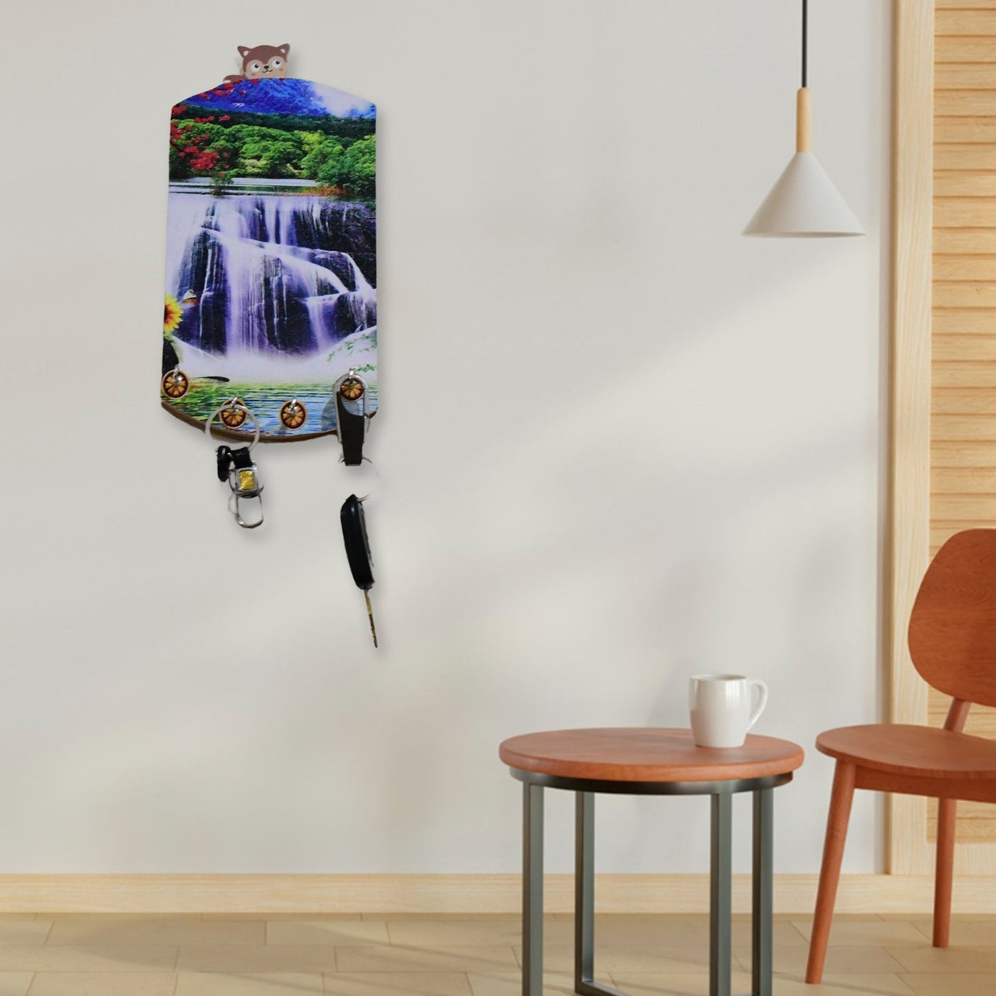 Wooden wall decor with scenic vertical design and hanging hooks.