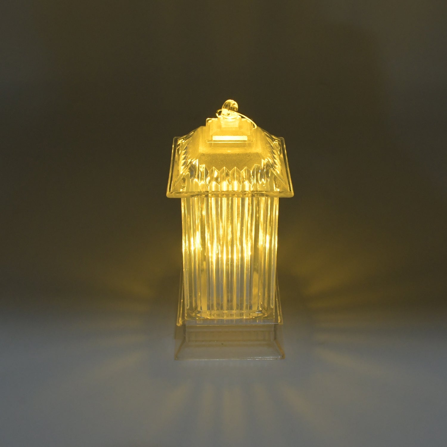 Lantern-shaped LED light with flickering crystal candle effect