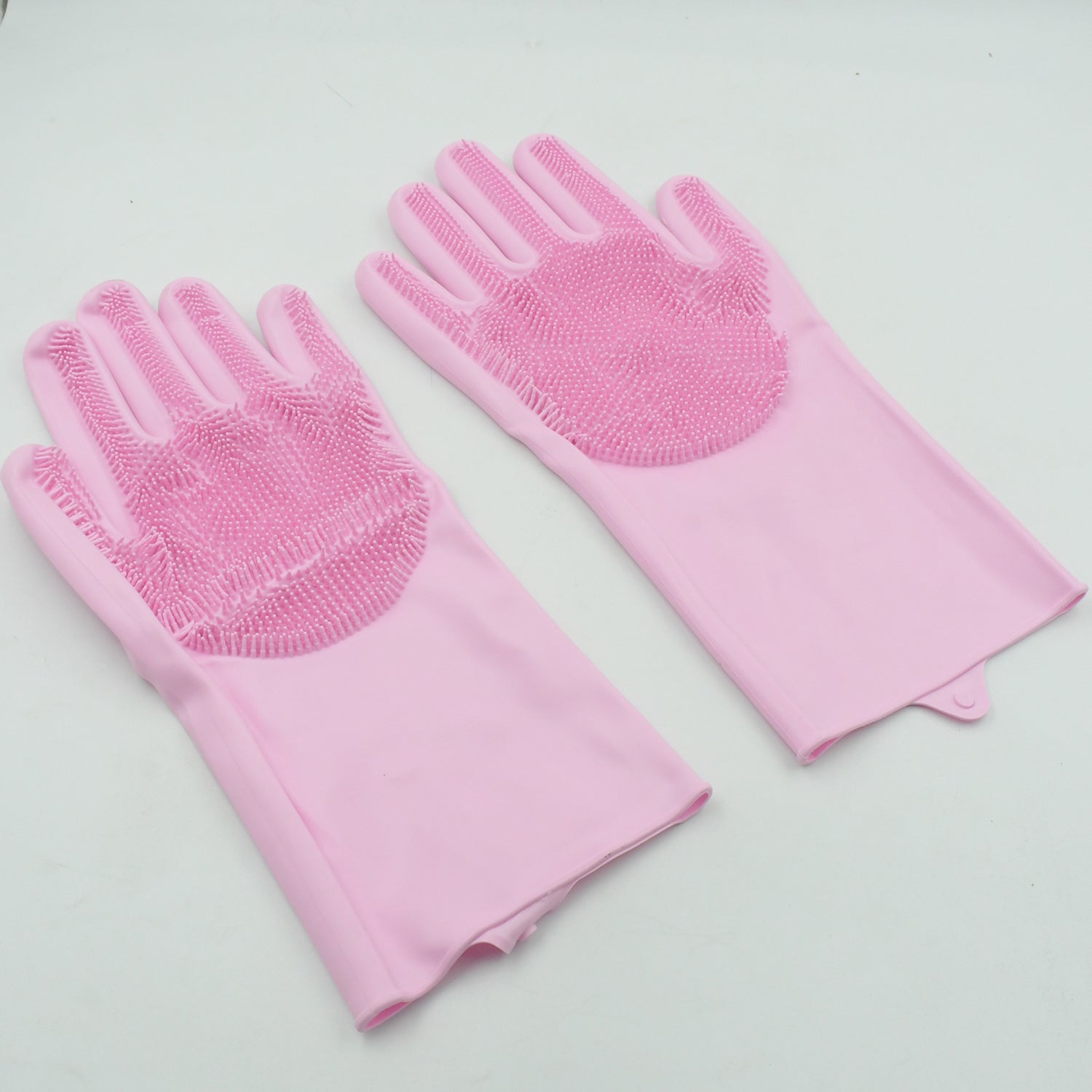 Close-up of silicone gloves with scrubber for effective washing