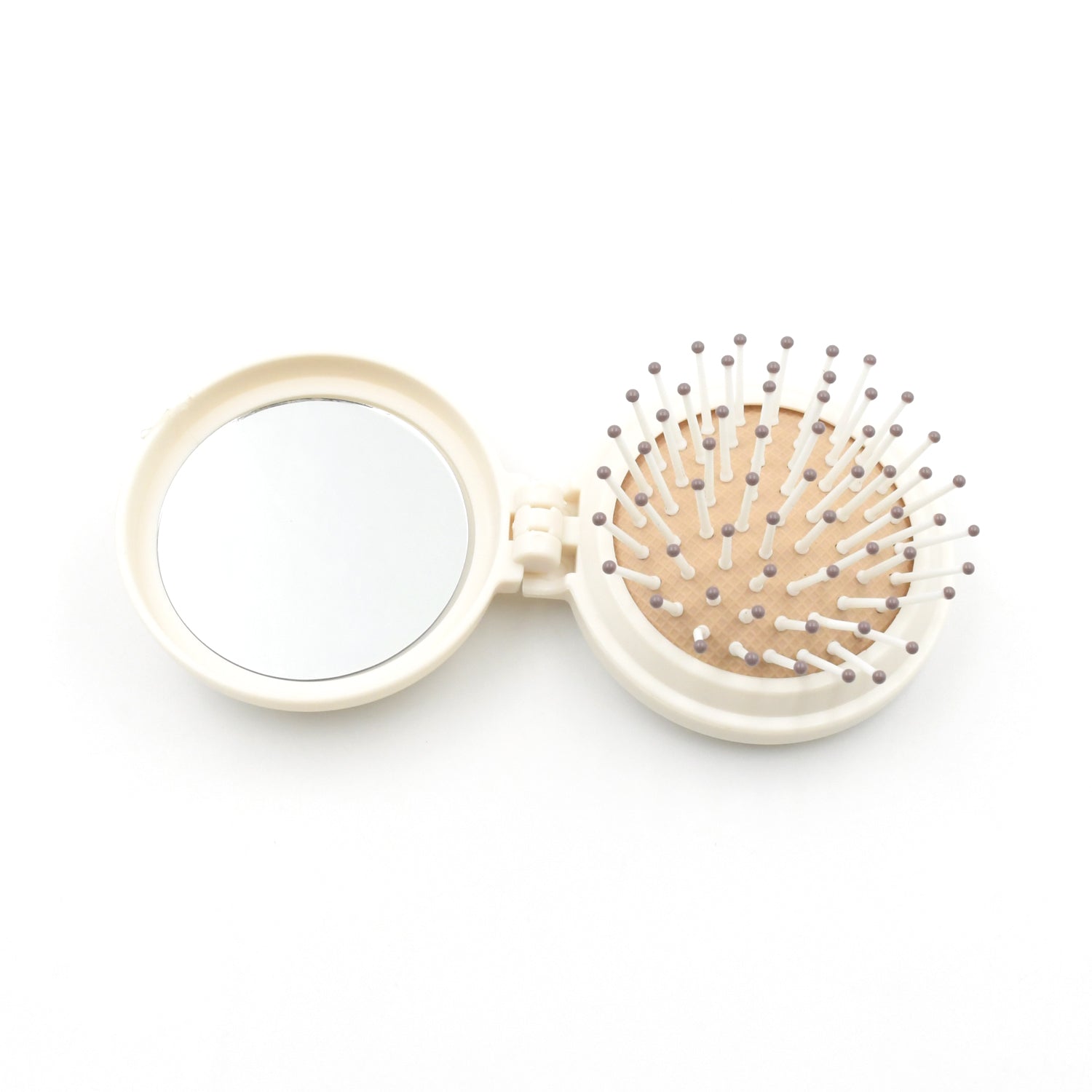 Mini hair brush with mirror, perfect for travel and compact storage