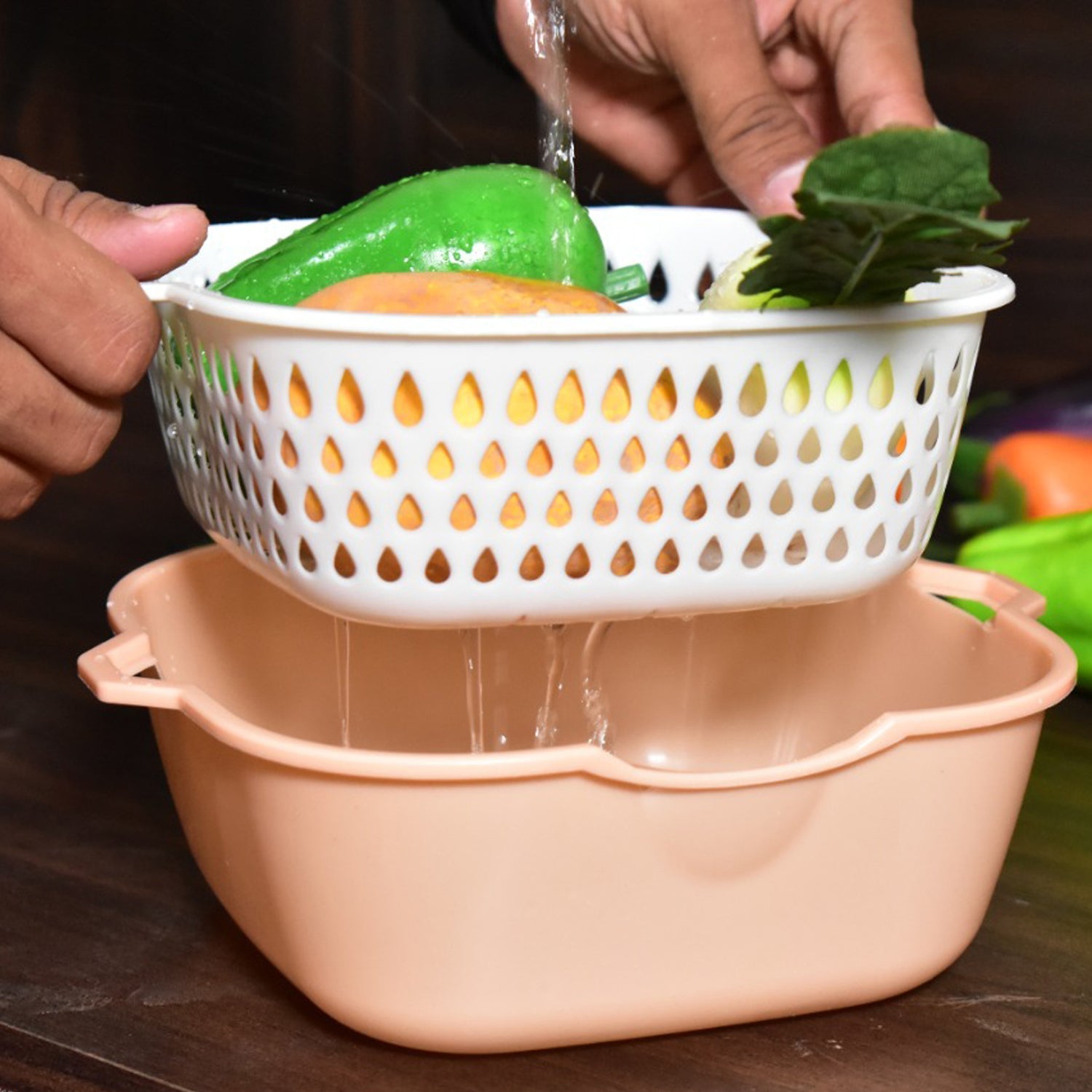 Strainer with basket feature for easy rinsing of food items