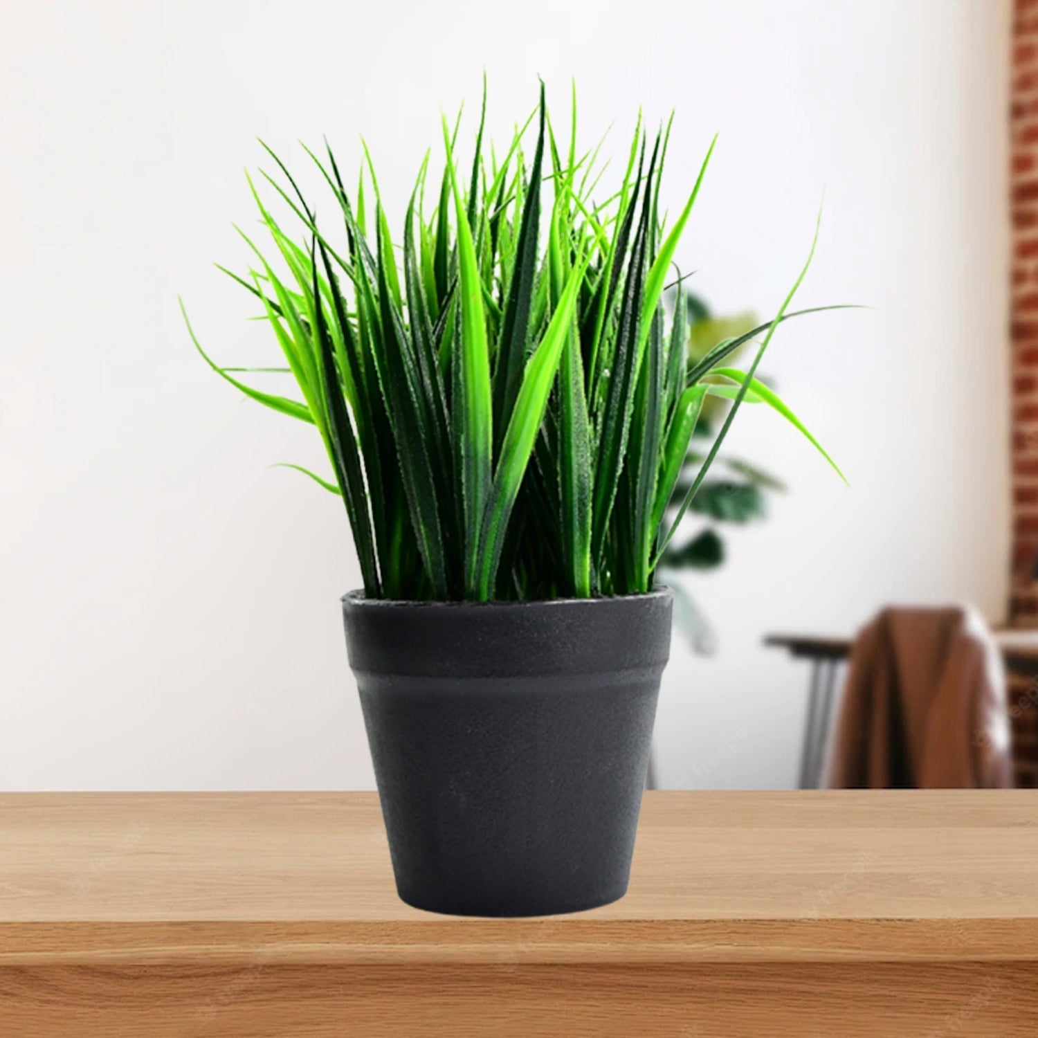 Artificial potted plant with a decorative pot.