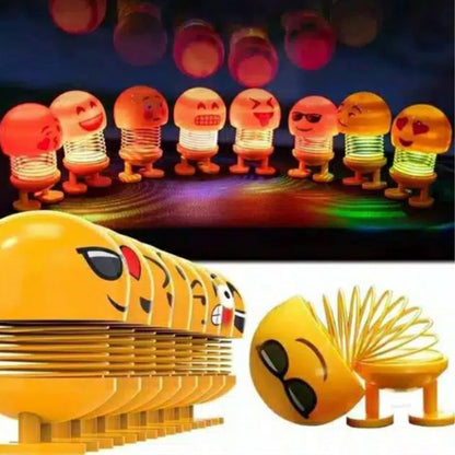 Car interior LED emoji doll.