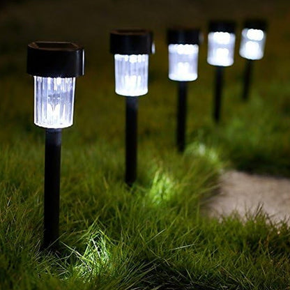 Sleek solar LED garden light with spike installation for easy placement.