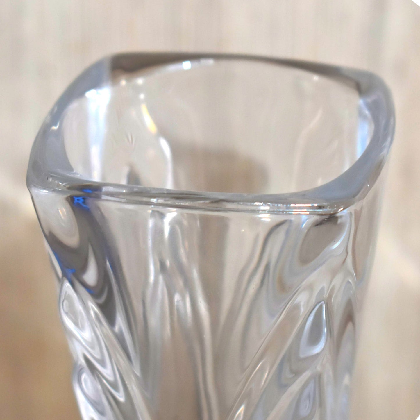 Decorative glass flower pot for living space.