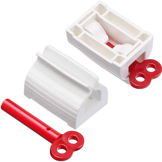 Toothpaste squeezer and holder stand for rolling tubes