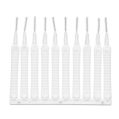 Anti-clogging shower head cleaning brushes