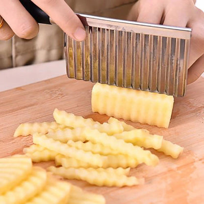 Wavy blade potato chip cutter for creating crinkle-cut fries and chips at home.