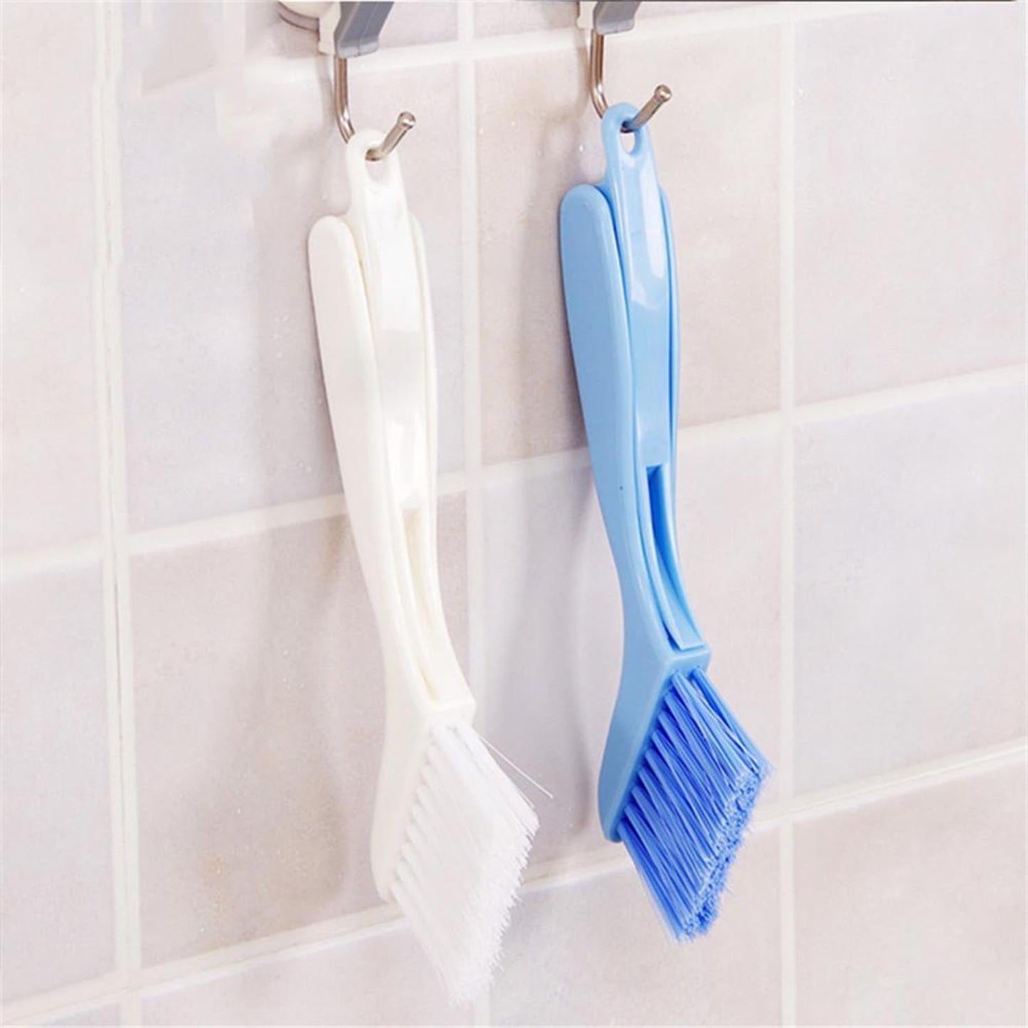 Portable brush and cleaner with an ergonomic handle for easy use