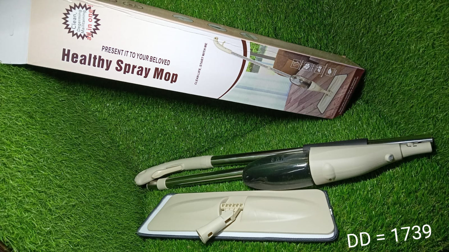 Spray mop with ergonomic handle and removable pad