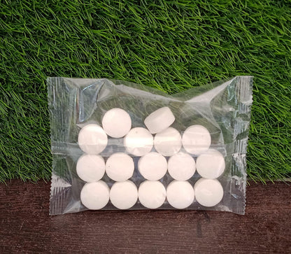 White naphthalene balls in a 100 grams pack for freshening up spaces.