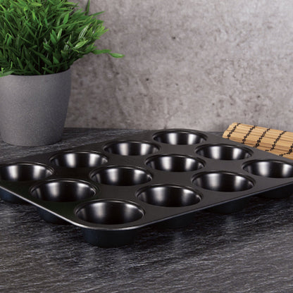 Top-down view of the muffin tray with 12 cavities, showing its nonstick surface and baking capabilities