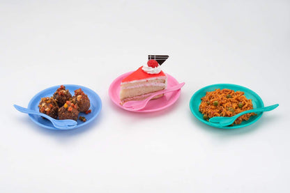 Snack set featuring a bowl, dish, and spoon in use.