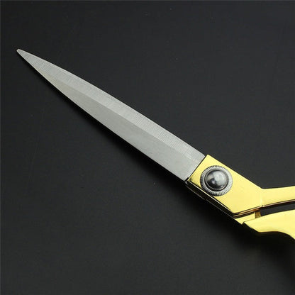 Gold-plated professional scissors for seamless fabric cuts.