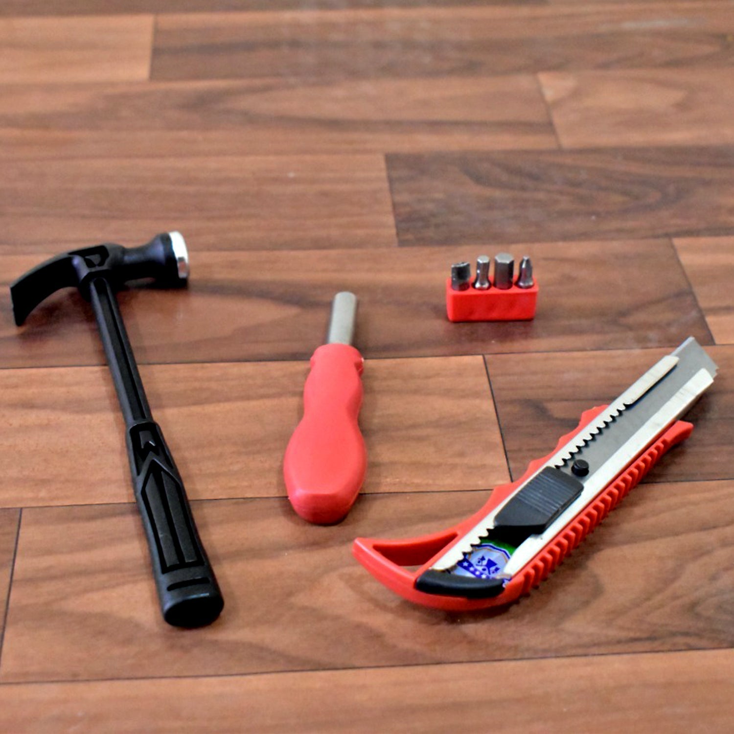 4-piece tool set arranged on a plain background.