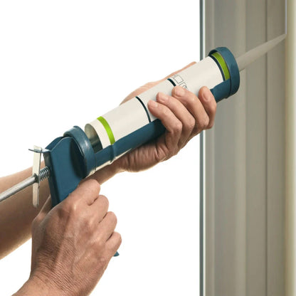 Professional-grade steel caulking gun for silicone sealant.